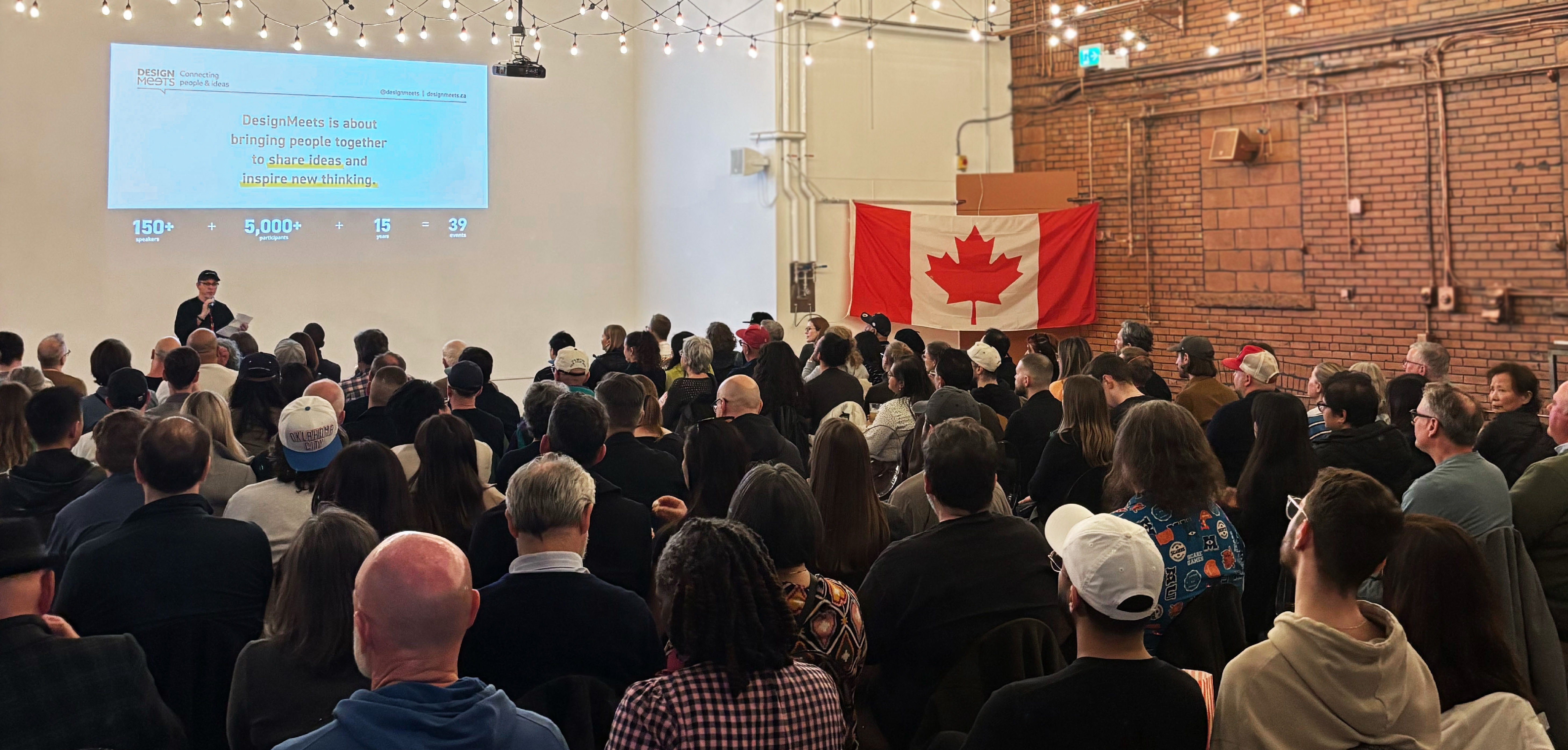 A photo of a crowd at a DesignMeets event